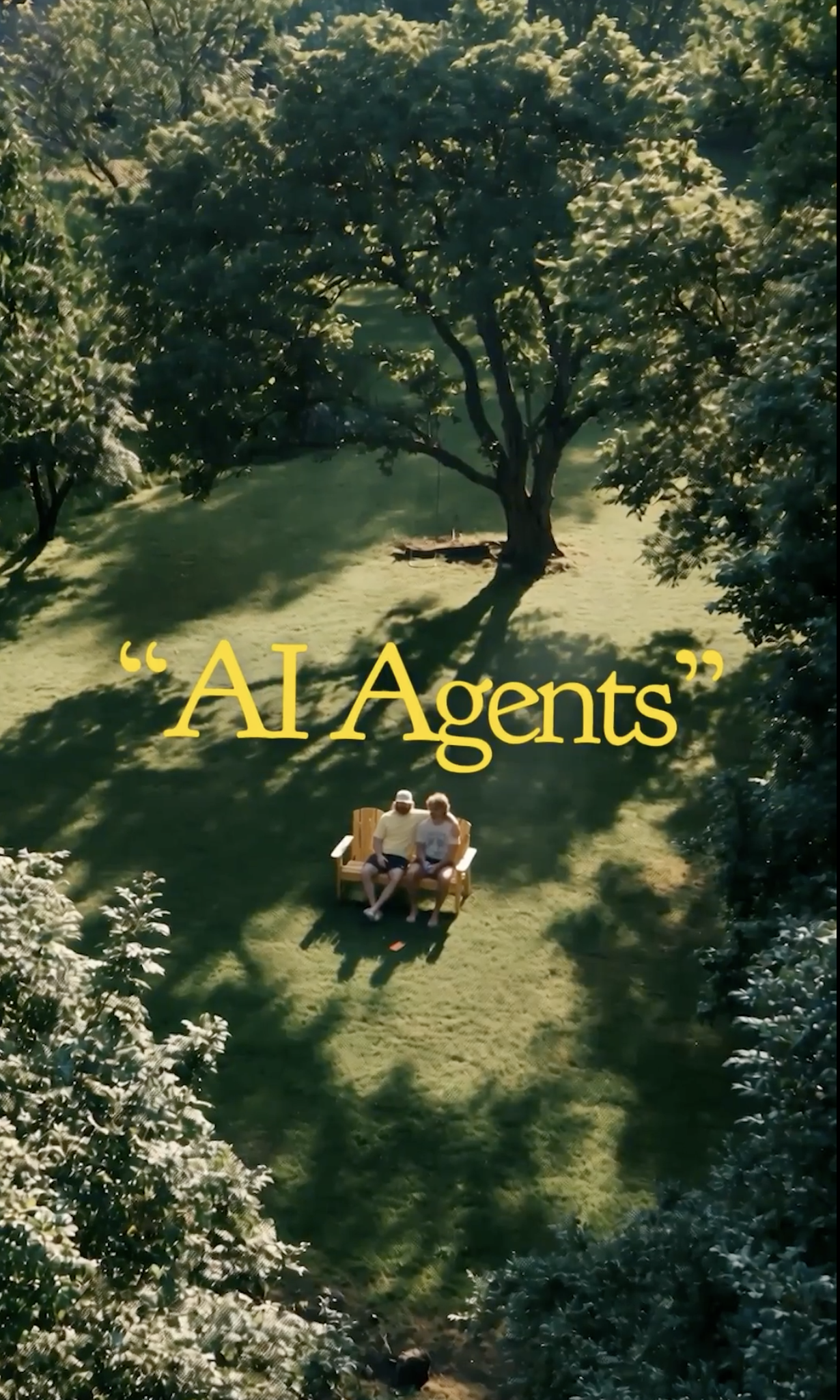 Aerial view of two people sitting beneath trees with the words AI Agents in yellow